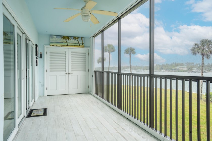 This remodeled condo offers breathtaking views of the turquoise - photo 31