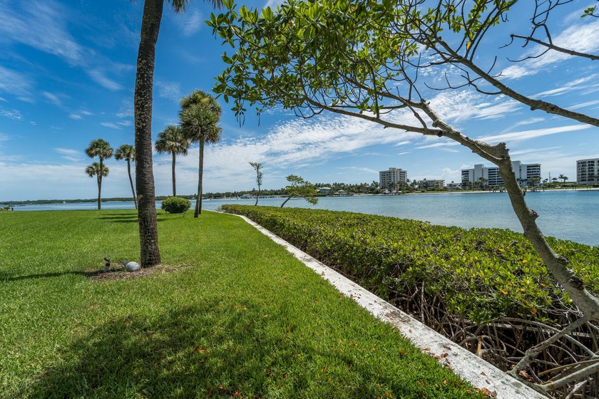 This remodeled condo offers breathtaking views of the turquoise - photo 34