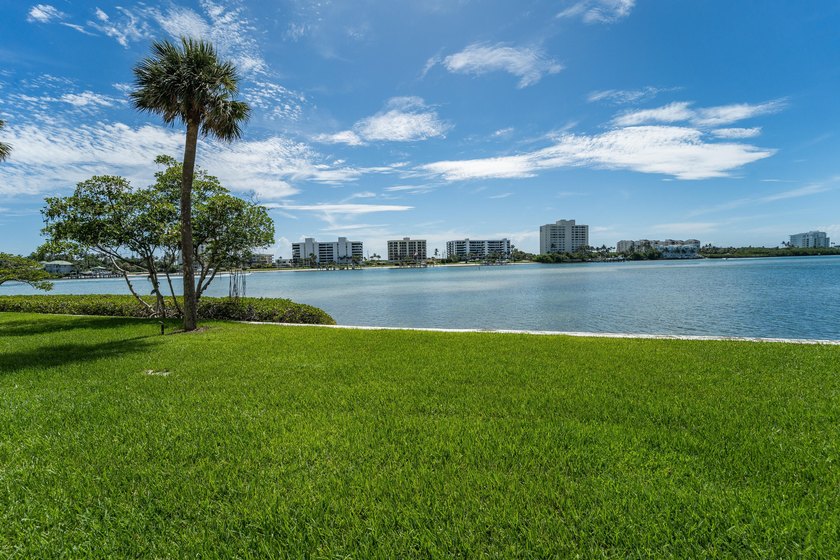 This remodeled condo offers breathtaking views of the turquoise - photo 35