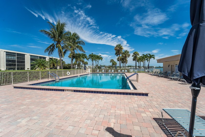 This remodeled condo offers breathtaking views of the turquoise - photo 36