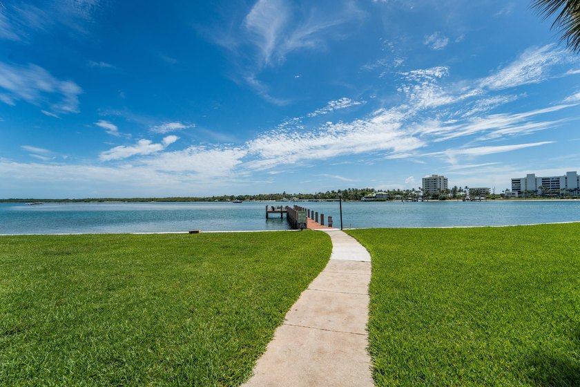 This remodeled condo offers breathtaking views of the turquoise - photo 38