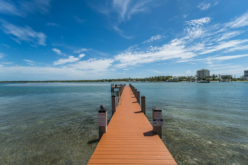 This remodeled condo offers breathtaking views of the turquoise - photo 39