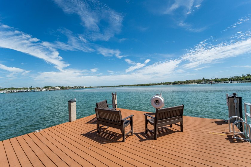 This remodeled condo offers breathtaking views of the turquoise - photo 40