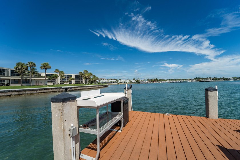 This remodeled condo offers breathtaking views of the turquoise - photo 41