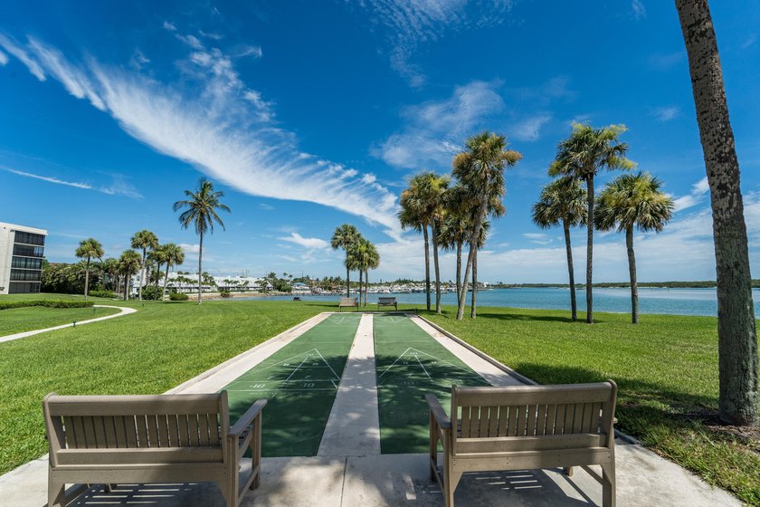 This remodeled condo offers breathtaking views of the turquoise - photo 44