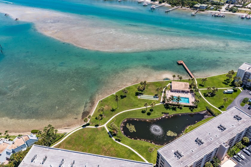 This remodeled condo offers breathtaking views of the turquoise - photo 45