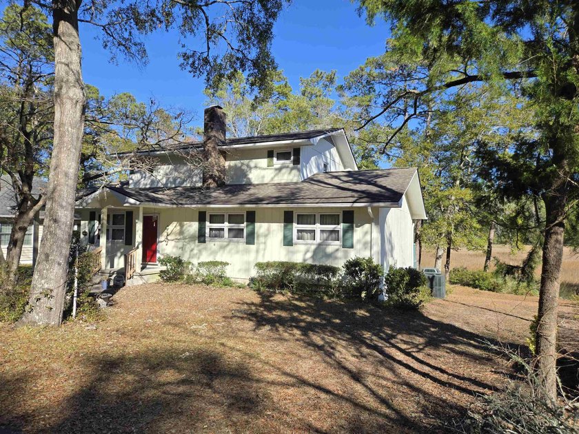 This is a wonderful home that sits on the marsh in Windjammer - photo 2