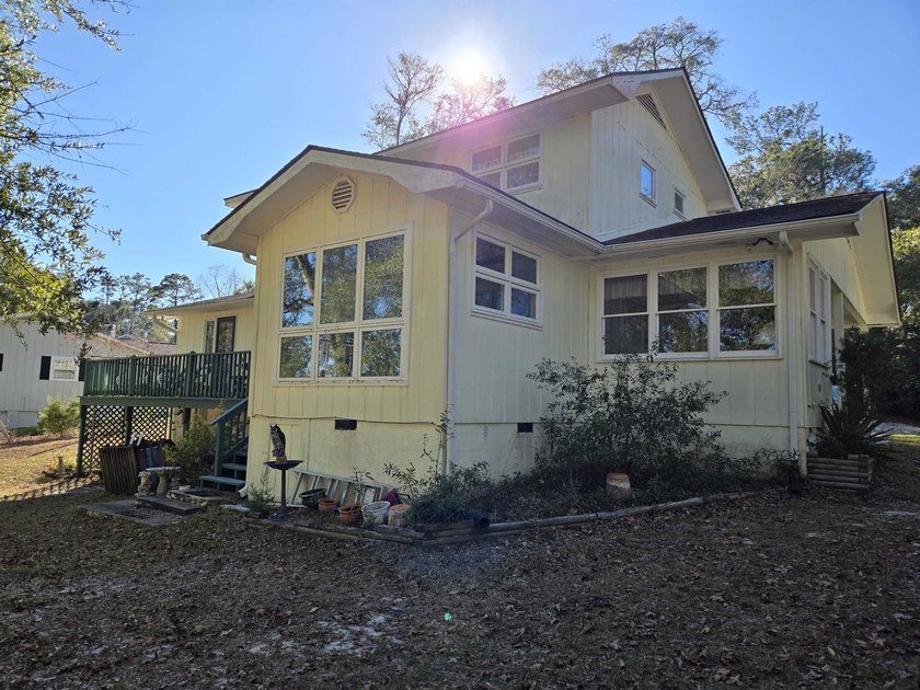 This is a wonderful home that sits on the marsh in Windjammer - photo 3