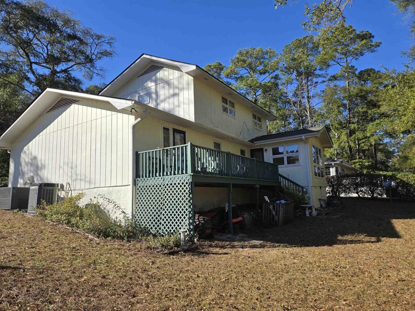 This is a wonderful home that sits on the marsh in Windjammer - photo 4