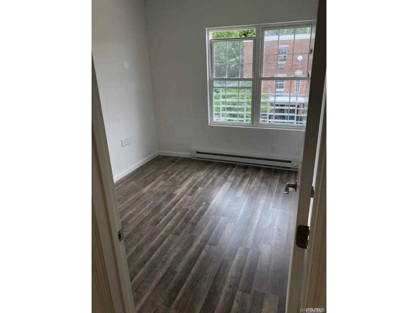 Newly Renovated Detached Two-Family Home in the Heart of - photo 4