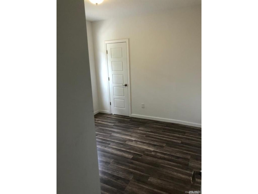 Newly Renovated Detached Two-Family Home in the Heart of - photo 5