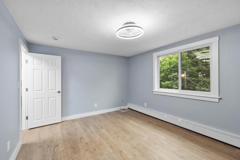Stunning 2026 Renovation ~ Kitchen, Bath, Lighting, Windows - photo 22