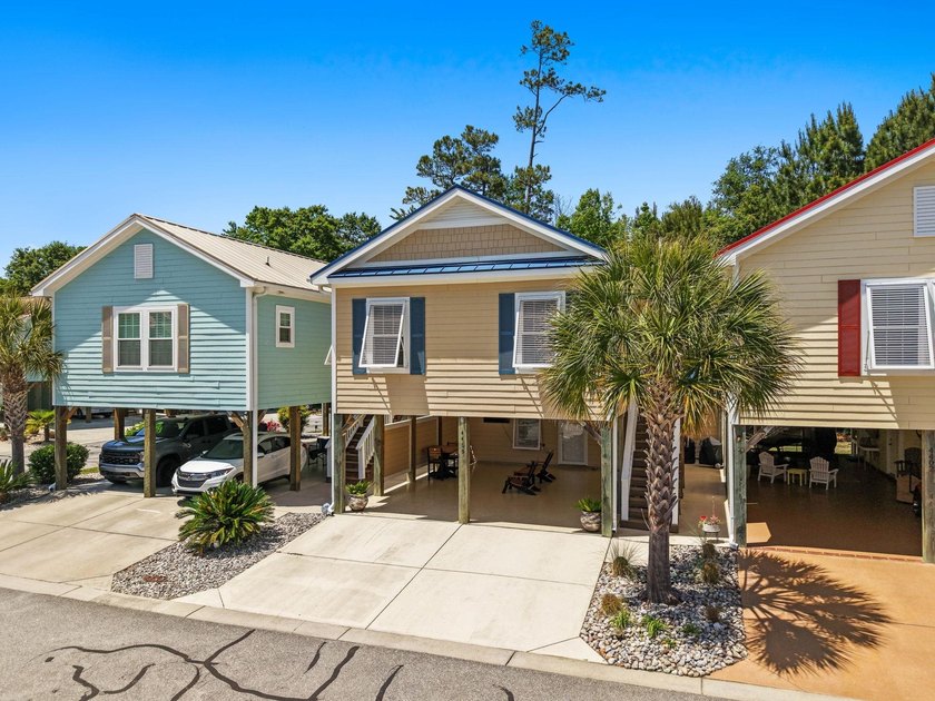 Welcome to coastal living at 4409 Grande Harbour Blvd in the - photo 3