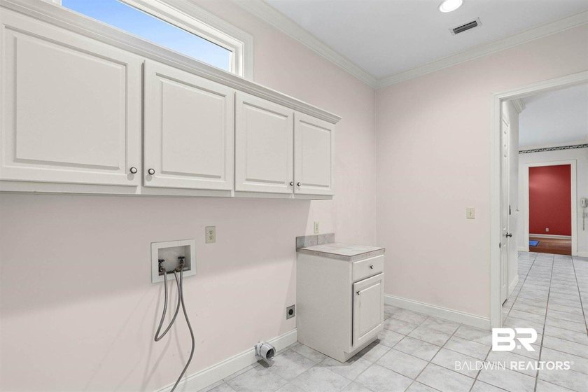 Welcome to this beautifully designed custom home in the highly - photo 21