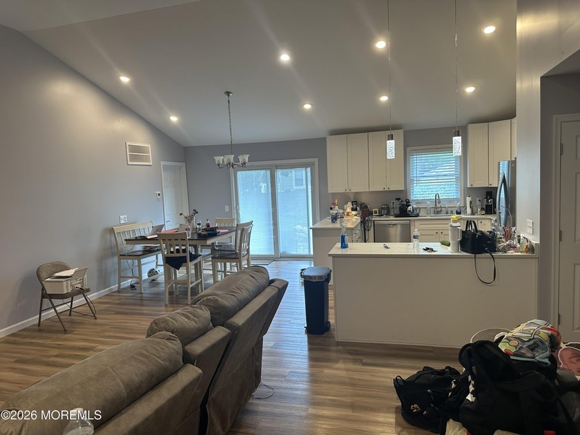 Totally renovated 2023. Open kitchen/living room floor plan with - photo 5