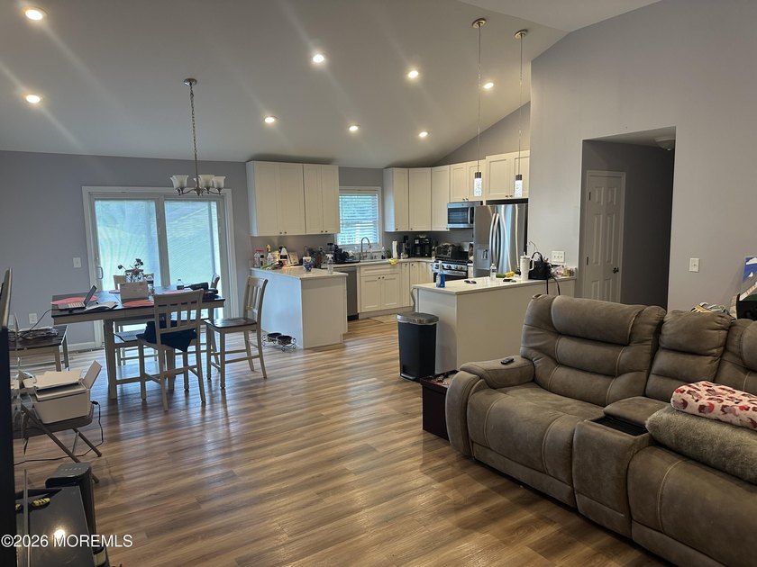 Totally renovated 2023. Open kitchen/living room floor plan with - photo 8