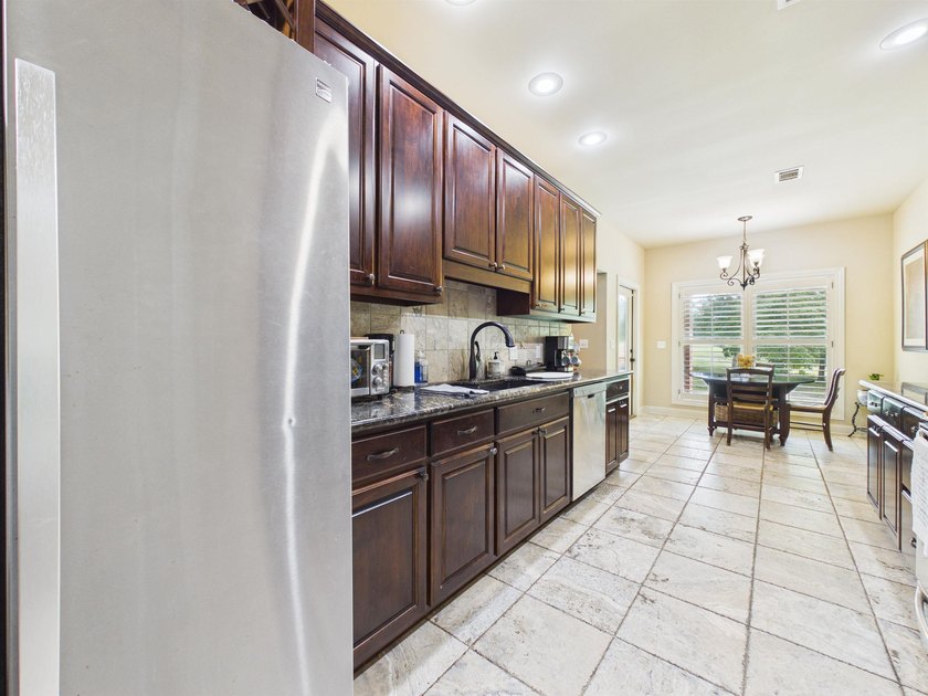 Beautiful 3 bed, 2 bath brick home on the golf course in The - photo 11