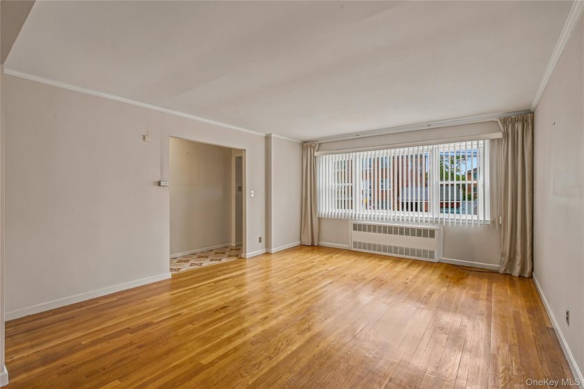 Welcome to this well-maintained two-family home offering an - photo 4