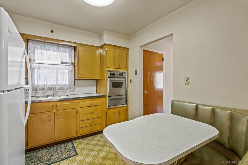 Welcome to this well-maintained two-family home offering an - photo 6