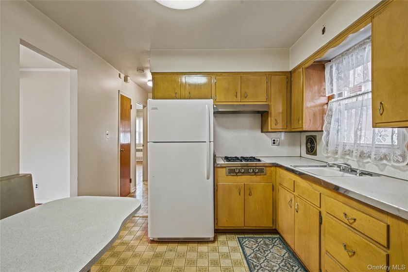 Welcome to this well-maintained two-family home offering an - photo 7