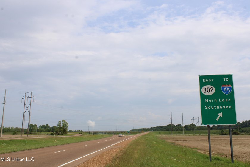 93+/- acres with long frontage on Hwy 302 (Goodman Rd) and also - photo 45