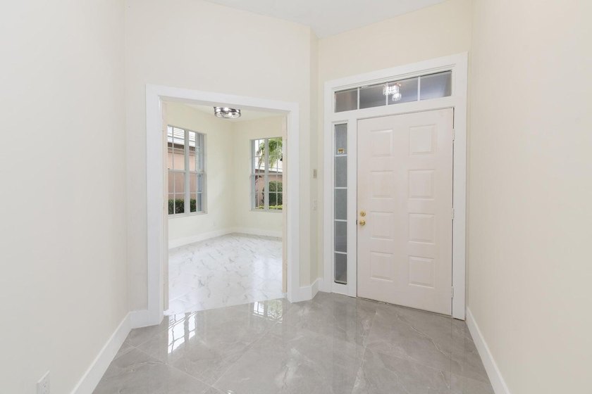 Welcome to this fully renovated 3-bedroom, 2.5-bathroom home - photo 3