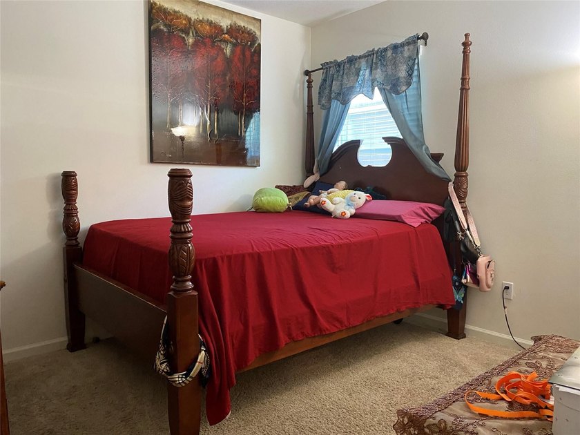 Step into this inviting 3-bedroom, 2-bath home located in the - photo 11