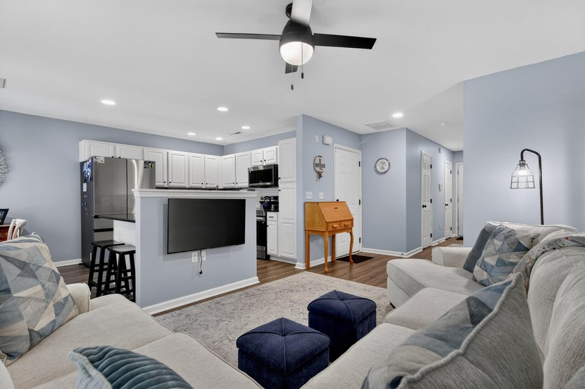This recently renovated townhome, with updates that actually - photo 3