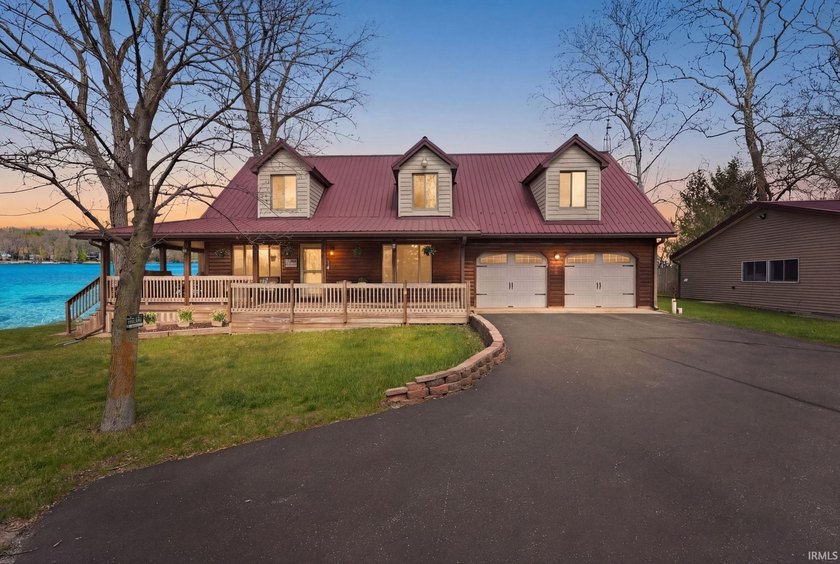 Imagine waking up to 264 feet of shimmering Rock Lake shoreline - photo 2