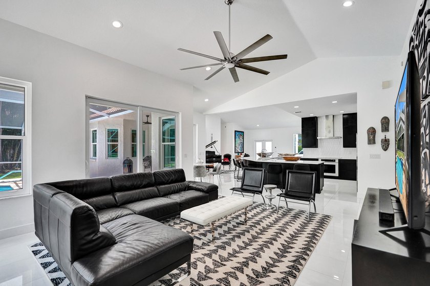 $35,000 ROOF CREDIT. NEW: AC, IMPACT WINDOWS &amp; CUSTOM KITCHEN - photo 4