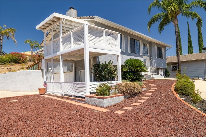Discover this beautiful 2-story family home ideally situated on - photo 2
