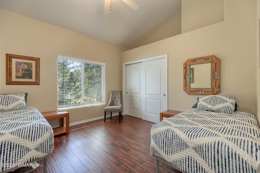 Nestled among the tall pines and bordering National Forest! This - photo 16