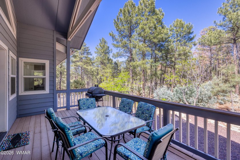 Nestled among the tall pines and bordering National Forest! This - photo 23