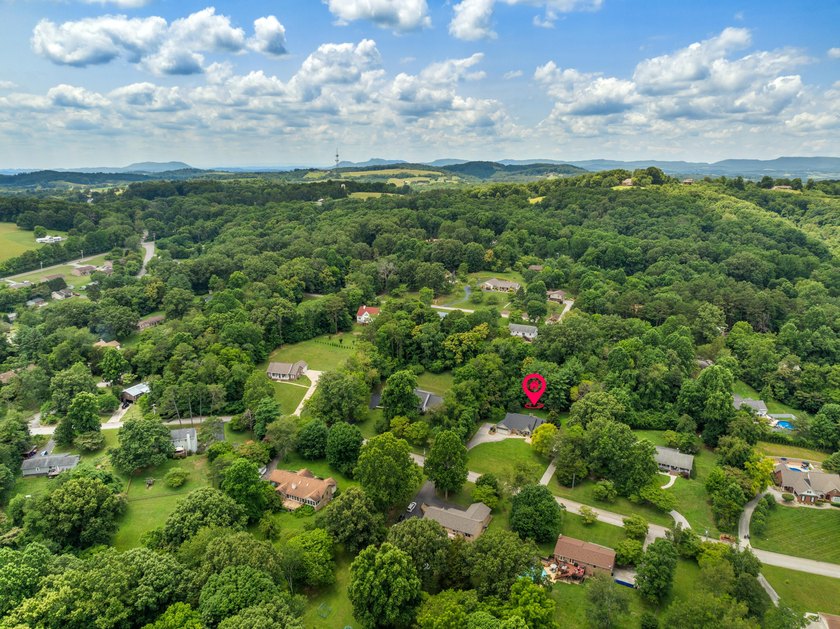 Tucked just minutes from the lake, this spacious home offers - photo 5