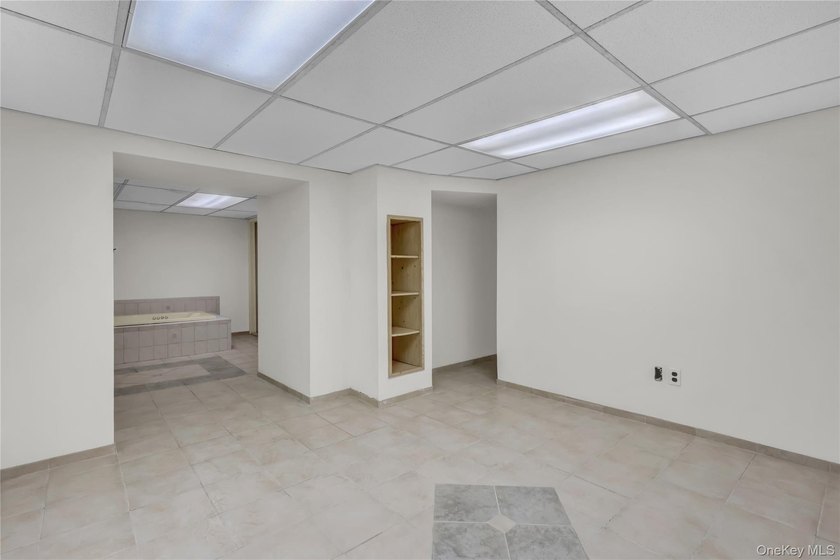 Set on nearly an acre in the heart of Miller Place, this - photo 21
