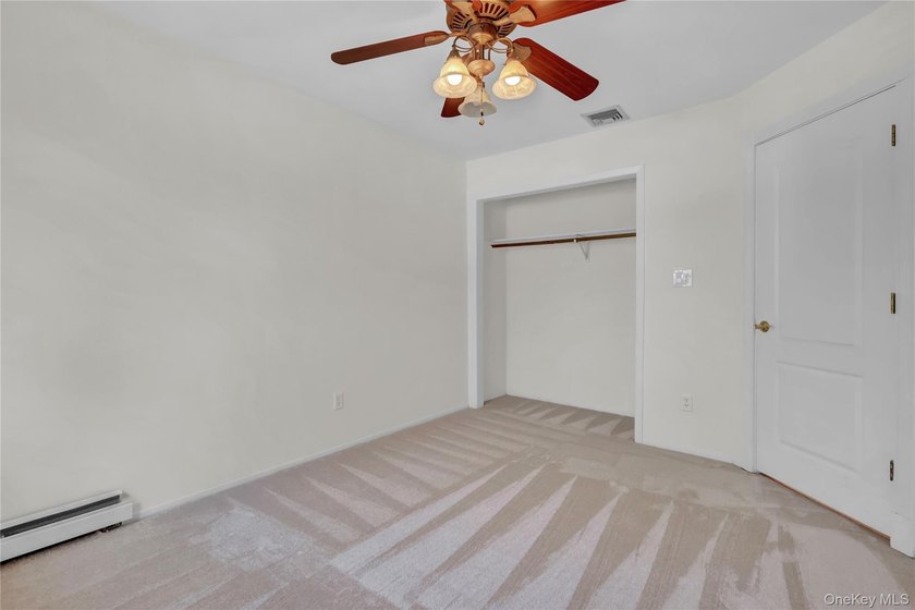 Set on nearly an acre in the heart of Miller Place, this - photo 28