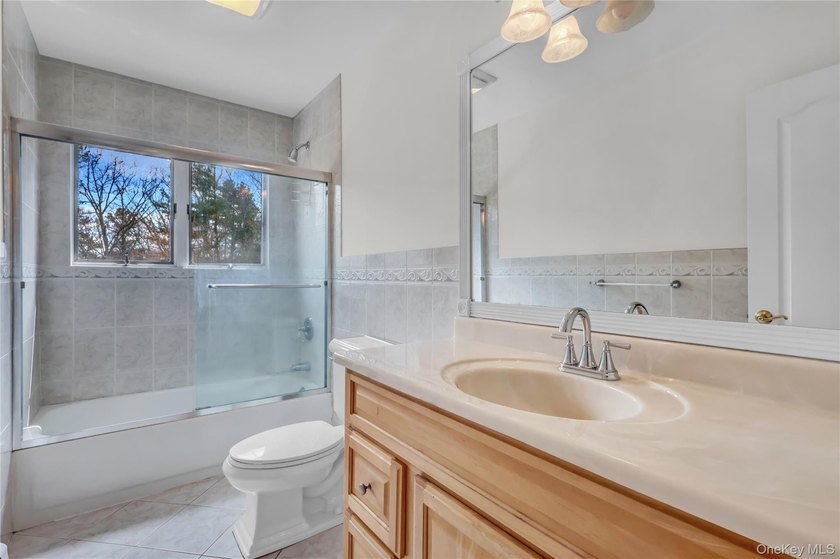 Set on nearly an acre in the heart of Miller Place, this - photo 29