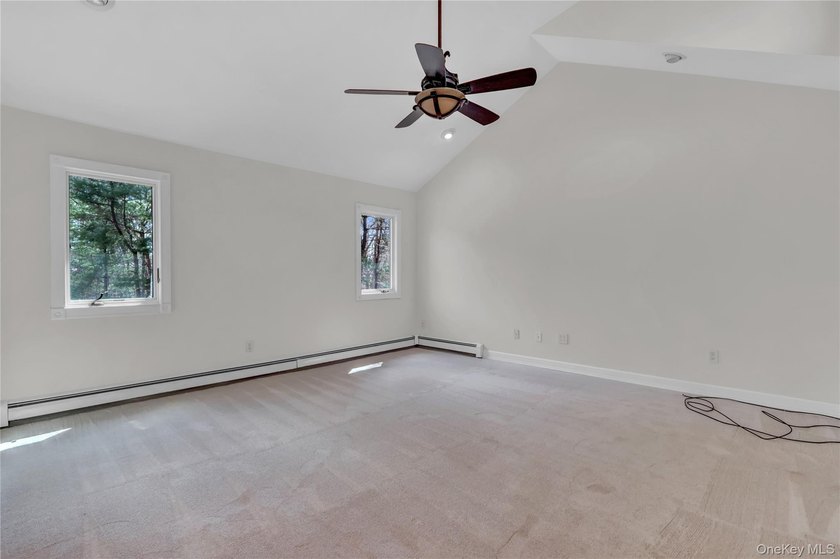 Set on nearly an acre in the heart of Miller Place, this - photo 31