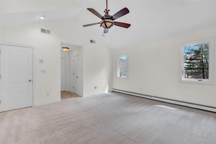 Set on nearly an acre in the heart of Miller Place, this - photo 32