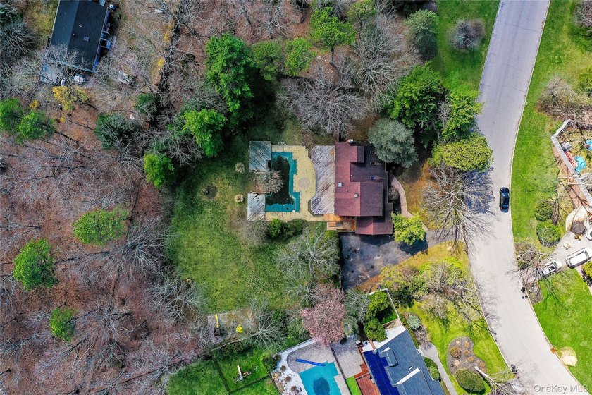 Set on nearly an acre in the heart of Miller Place, this - photo 42