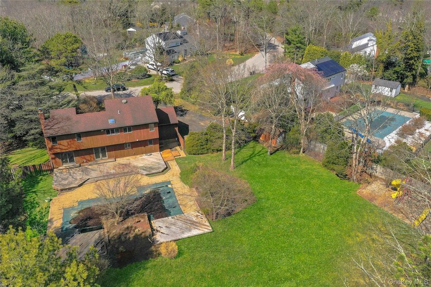 Set on nearly an acre in the heart of Miller Place, this - photo 45