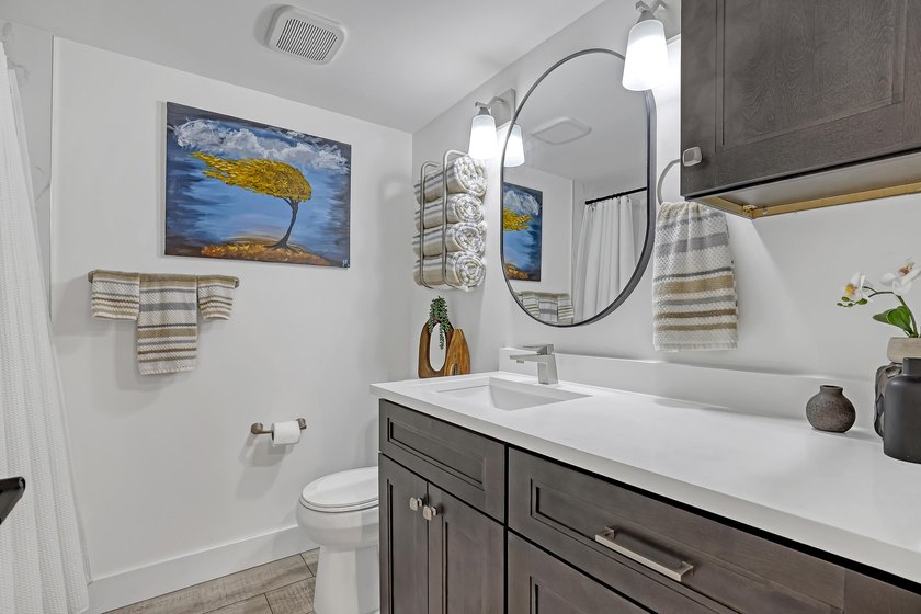 Welcome to this beautifully updated, light-filled corner unit - photo 11