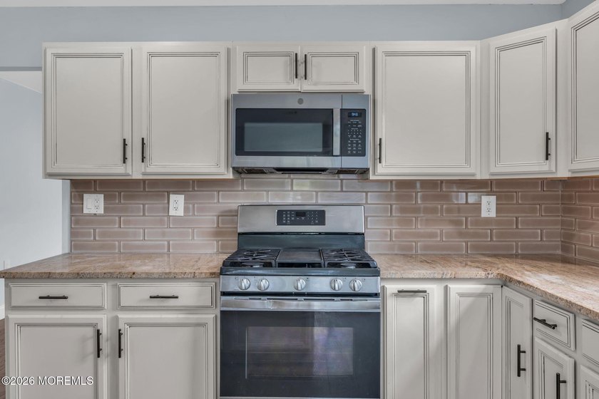 Welcome to 2 Ashcroft Lane, a charming 2-bed, 2-bath Lakeview - photo 12