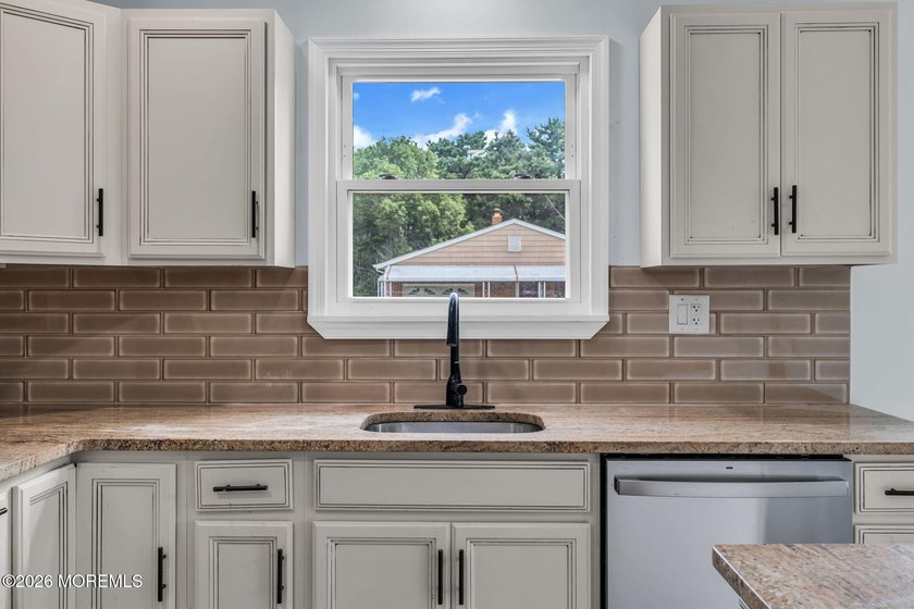 Welcome to 2 Ashcroft Lane, a charming 2-bed, 2-bath Lakeview - photo 15