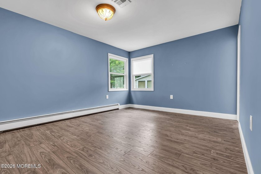 Welcome to 2 Ashcroft Lane, a charming 2-bed, 2-bath Lakeview - photo 16