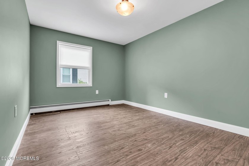 Welcome to 2 Ashcroft Lane, a charming 2-bed, 2-bath Lakeview - photo 20