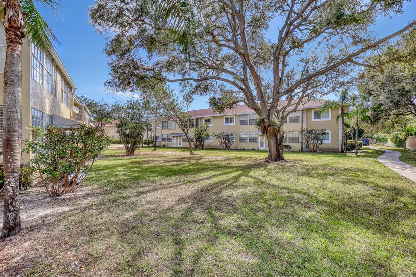 Welcome to this beautifully updated, light-filled corner unit - photo 31