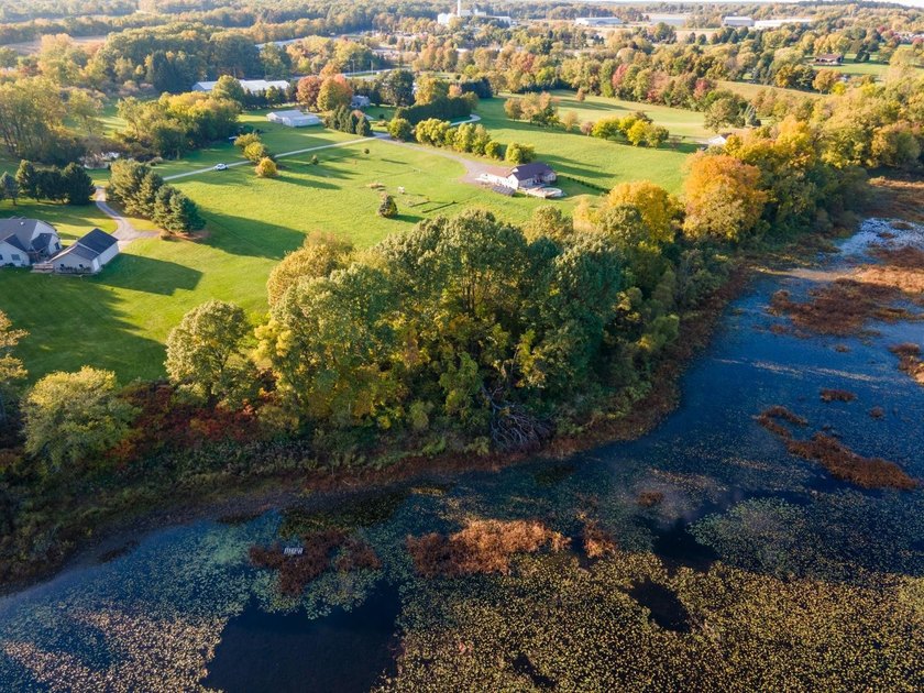 So much potential with this nearly 5 1/2 Acre lot located on - photo 4