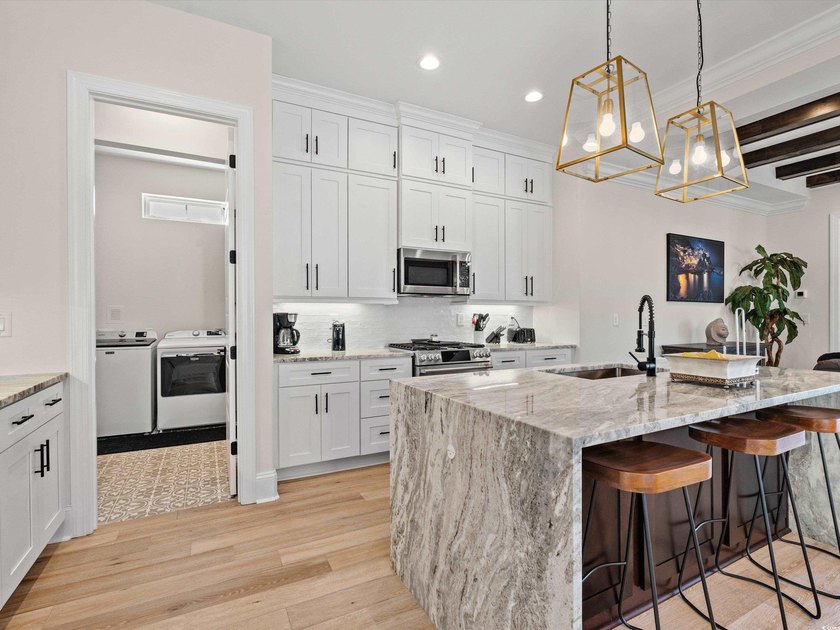 Located in the gated Ocean Villas at 67th community, home to - photo 12
