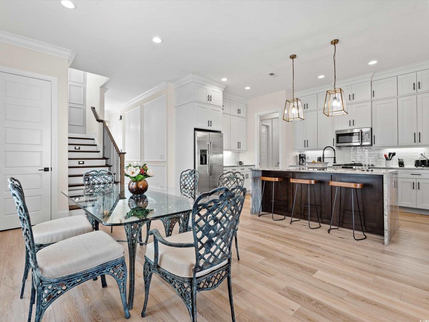 Located in the gated Ocean Villas at 67th community, home to - photo 13